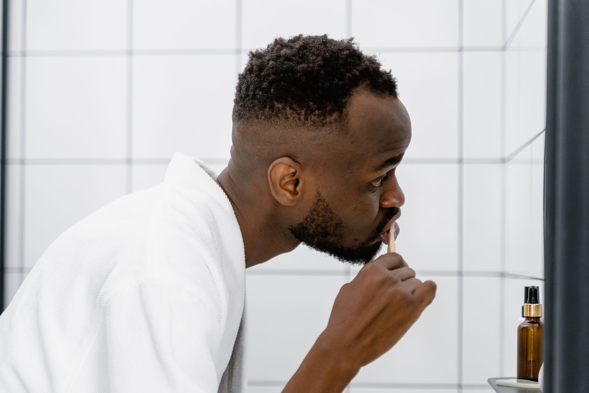 Bleeding gums visible on a toothbrush during daily morning brushing