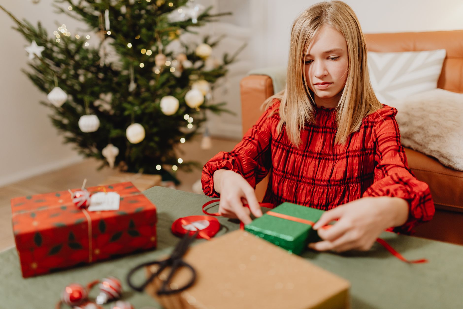 Unusual gifts for teens displayed on a wooden shelf, from quirky gadgets to handmade local objects